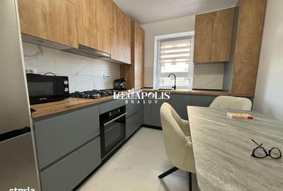 Apartament cu 3 camere decomandat în Tractorul - 4