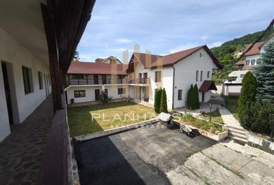 Proprietate cu 20 de camere și 11 ari de teren lângă Stadionul Baia Mare -