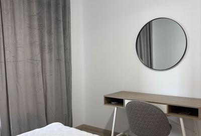 Apartament cu 2 camere decomandat în Tractorul