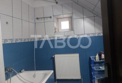 Casa in zona centrala 5 camere 2 bucatarii 3 bai curte comuna Cisnadie - 23