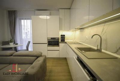 Apartament 3 camere, etaj 1, 70 mp, 1 parcare subterana, nou - 9