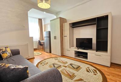 Garsoniera zona Judetean,mobilata modern,renovata,300 Euro - 1