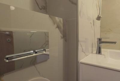 Apartament cu 3 camere decomandat în Costin Georgian - 2