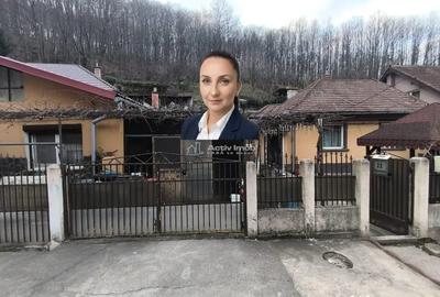 Casă cu 5 camere cu Teren 180 Mp în Muncitoresc