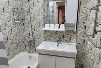 Garsonieră decomandată în Titan