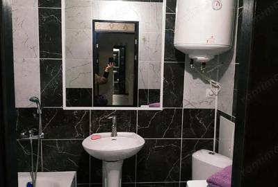 Garsonieră decomandată în Titan