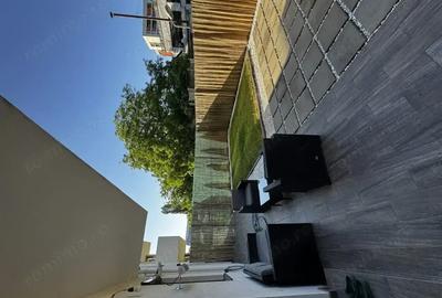 Apartament cu 2 camere + curte privata 70mp + loc de parcare acoperit