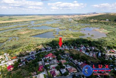 ID 7854 EXCLUSIVITATE – Teren cu casă și ieșire la canal - 7