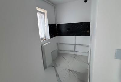 Garsonieră decomandată în Central - 11