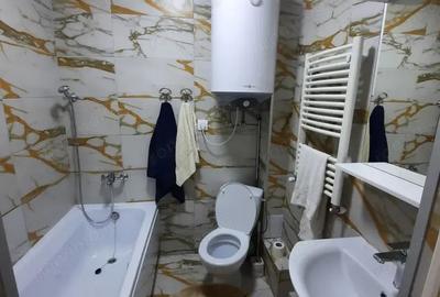Garsonieră decomandată în Titan