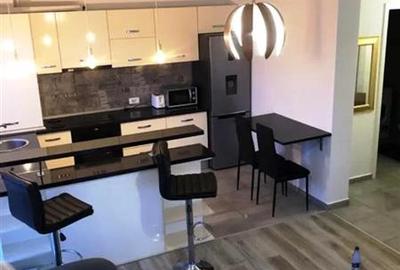 Apartament cu 2 camere decomandat, mobilat în Tractorul - 2