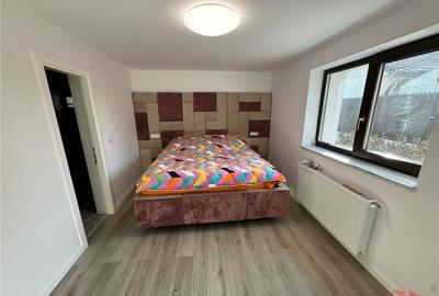 Cladire cu 3 apartamente in suprafata totala construita de 5 - 8