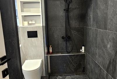Apartament cu 4 camere semidecomandat, mobilat în P-ța Universității - 10