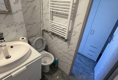 Garsonieră decomandată în Central - 7