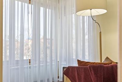 Apartament cu 8 camere semidecomandat, mobilat în Capitale - 7