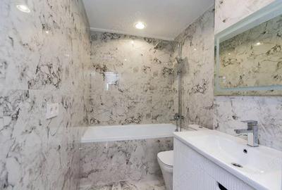 Garsonieră decomandată în Titan