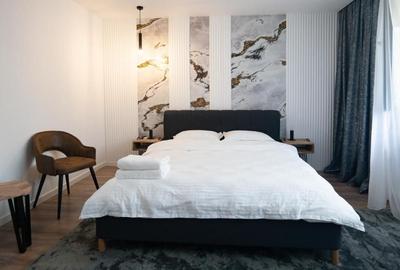 Garoniera bloc mixt etaj 5 din 10 Bd 1 Decembrie 1918 Titan - 1