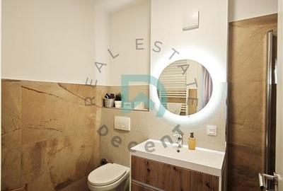 Apartament cu 4 camere decomandat în Tractorul - 22