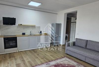 Apartamentul tip studio, centrala, ac, loc de parcare
