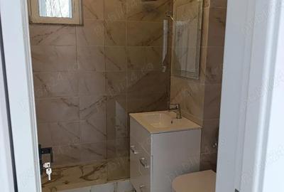 Apartament cu 3 camere decomandat în Dărmănești - 11