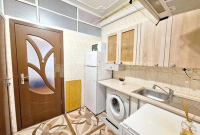 Garsoniera mobilata+camera la demisol, zona Tractorul, comision 0 - 3