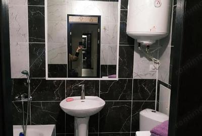 Garsonieră decomandată în Titan