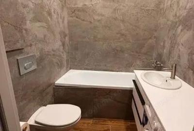 Garsonieră decomandată în Titan