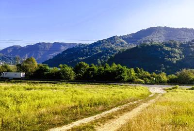 250 Ha TEREN PADURE pe VALEA OLTULUI, in Balota- Racovita, jud. Valcea, acces DE - 16