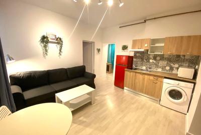 Apartament cu 3 camere semidecomandat, mobilat în Cișmigiu