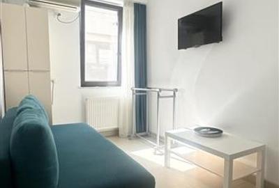 Apartament cu 2 camere semidecomandat, mobilat în Central