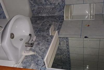 Garsonieră decomandată în Central - 8