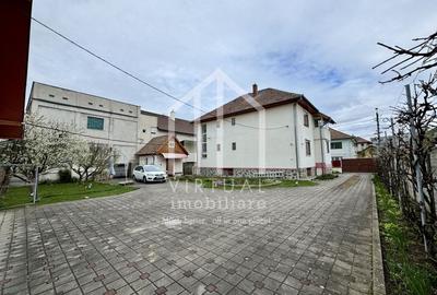 Casa individuala cu 6 camere + demisol 94mp utili, teren 972mp, garaje
