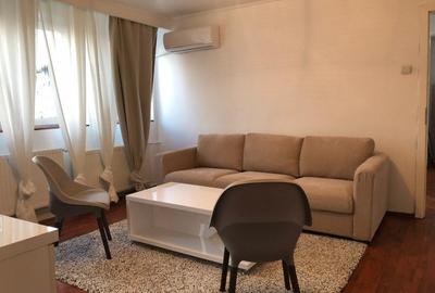 Apartament cu 3 camere semidecomandat în Romană