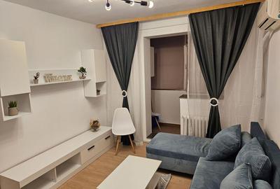 Apartament cu 2 camere decomandat, mobilat în Alexandru cel Bun