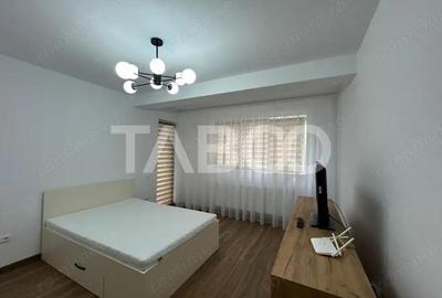 Garsoniera la prima inchiriere cu balcon gradina loc parcare Selimbar Garsoniera la prima inchiriere cu balcon gradina loc parcare Selimbar - 2