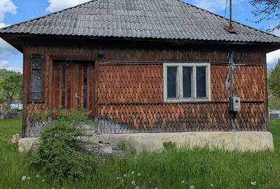 Vand casa ?i teren in comuna Moisei langa drumul principal DN 18 - 2