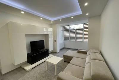 Apartament cu 2 camere semidecomandat, mobilat în Podu Roș