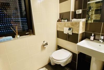 Apartament cu 4 camere decomandat în Voluntari - 9