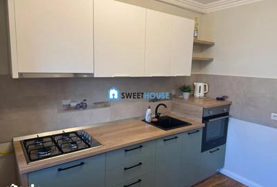 Apartament cu 2 camere, mobilat în Tractorul - 1