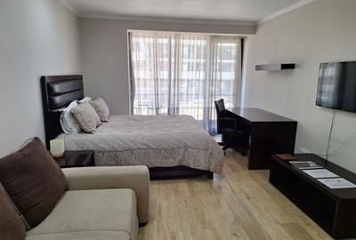 Apartament cu 2 camere decomandat în Tractorul
