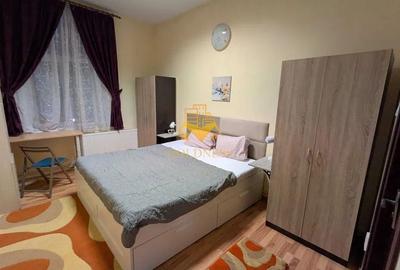 Apartament cu 3 camere semidecomandat, mobilat în Central