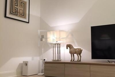 Apartament cu 5 camere semidecomandat, mobilat în Capitale - 1