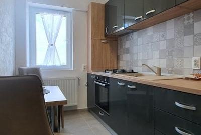 Apartament cu 2 camere decomandat, mobilat în Central