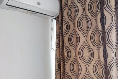 Garsonieră decomandată în 9 Mai - 2