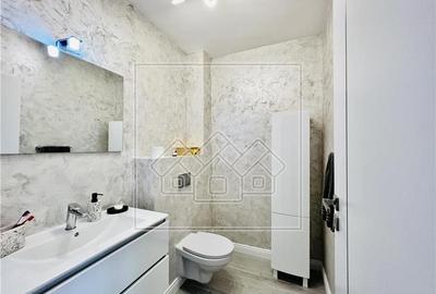 Casa de vanzare in Sibiu - la cheie - 4 camere, 3 bai, terasa - 9