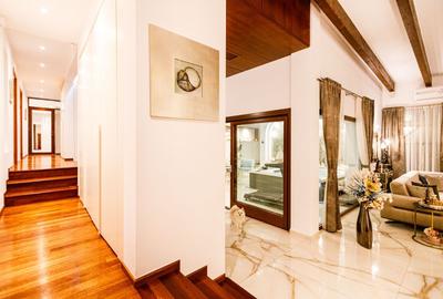 Arhitectura Distinsa: Casa Moderna Plan Parter si Piscina Privata - 9