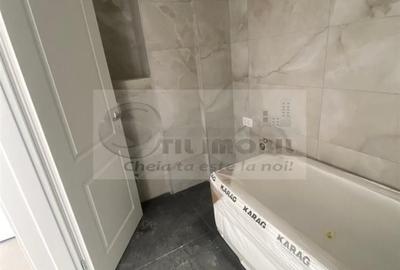 Garsonieră decomandată în Bucium - 9