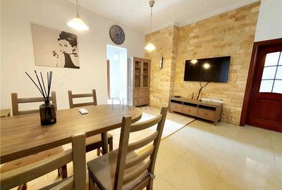 Apartament cu 3 camere semidecomandat, mobilat în Medicină