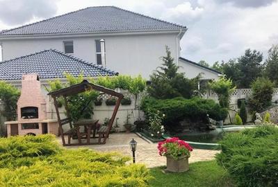 Casă cu 4 camere cu Teren 2300 Mp în Lunei - 2