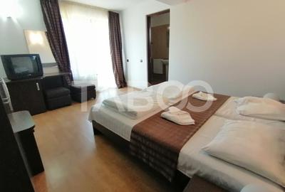 Pensiune 13 camere 16 bai sauna piscina si teren 1565 mp Cisnadioara - 12